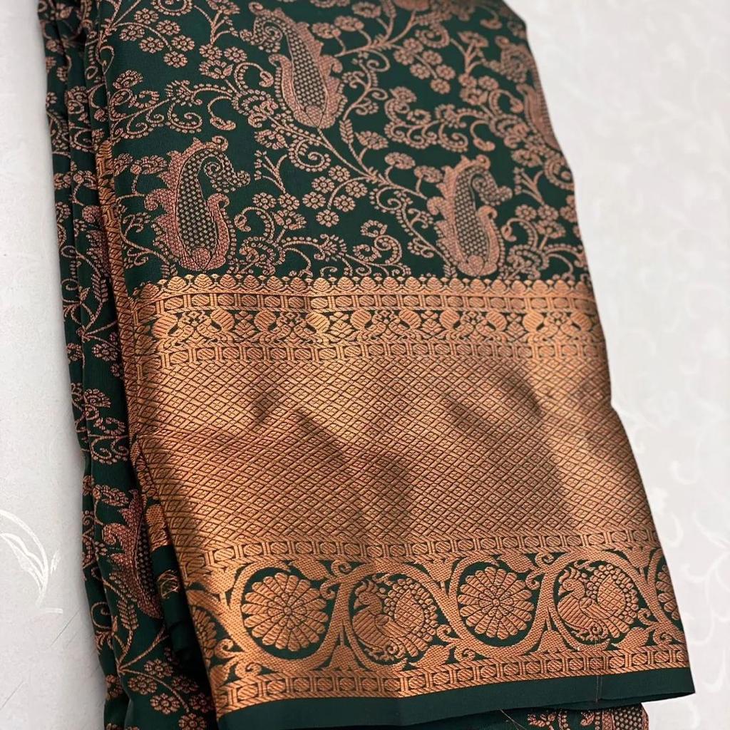 Dark Green Soft Silk Saree With Delectable Blouse Piece