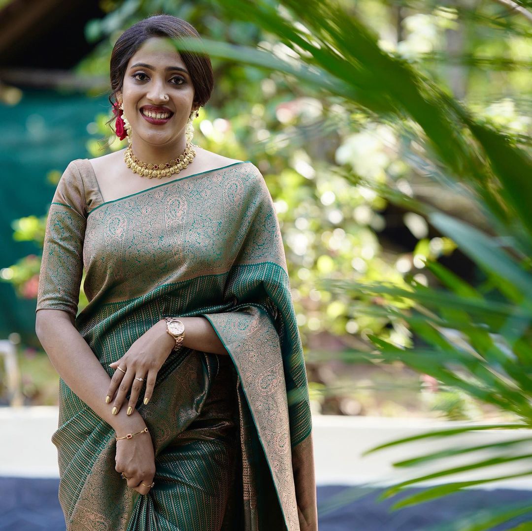 Dark Green Soft Silk Saree With Adorable Blouse Piece