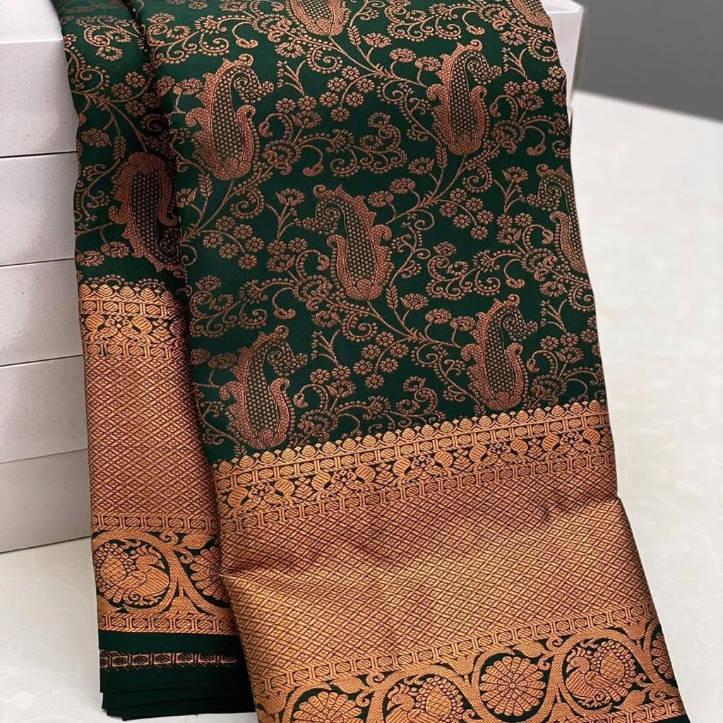 Dark Green Soft Silk Saree With Delectable Blouse Piece