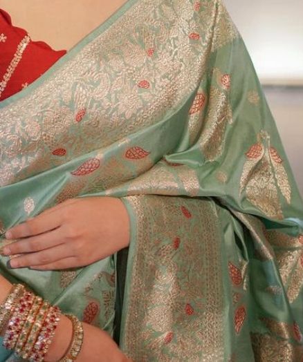 Demure Sea Green Soft Silk Saree With Magnetic Blouse Piece