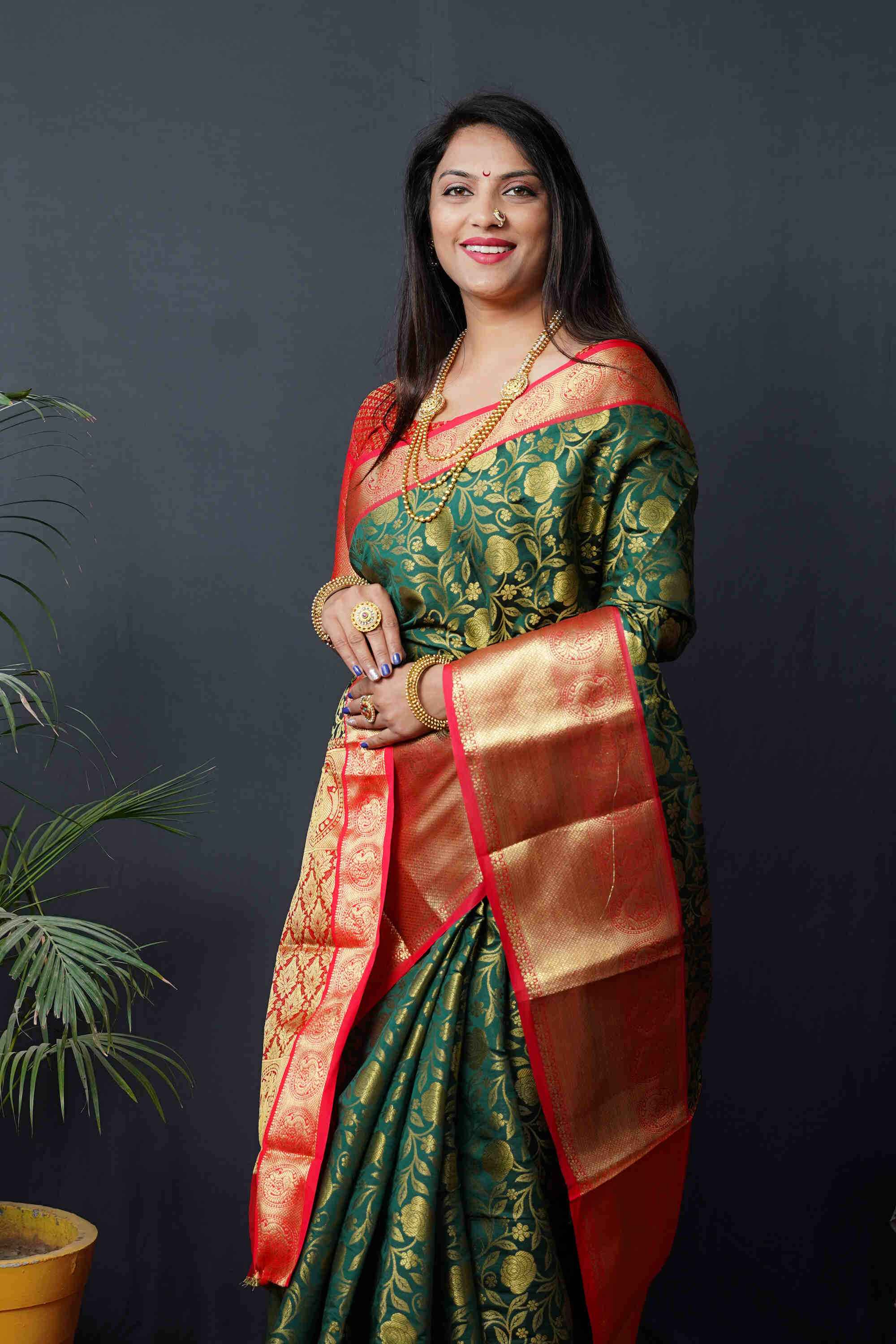 Dark Green  Kanjivaram Silk Woven Zari Saree with Blouse Piece