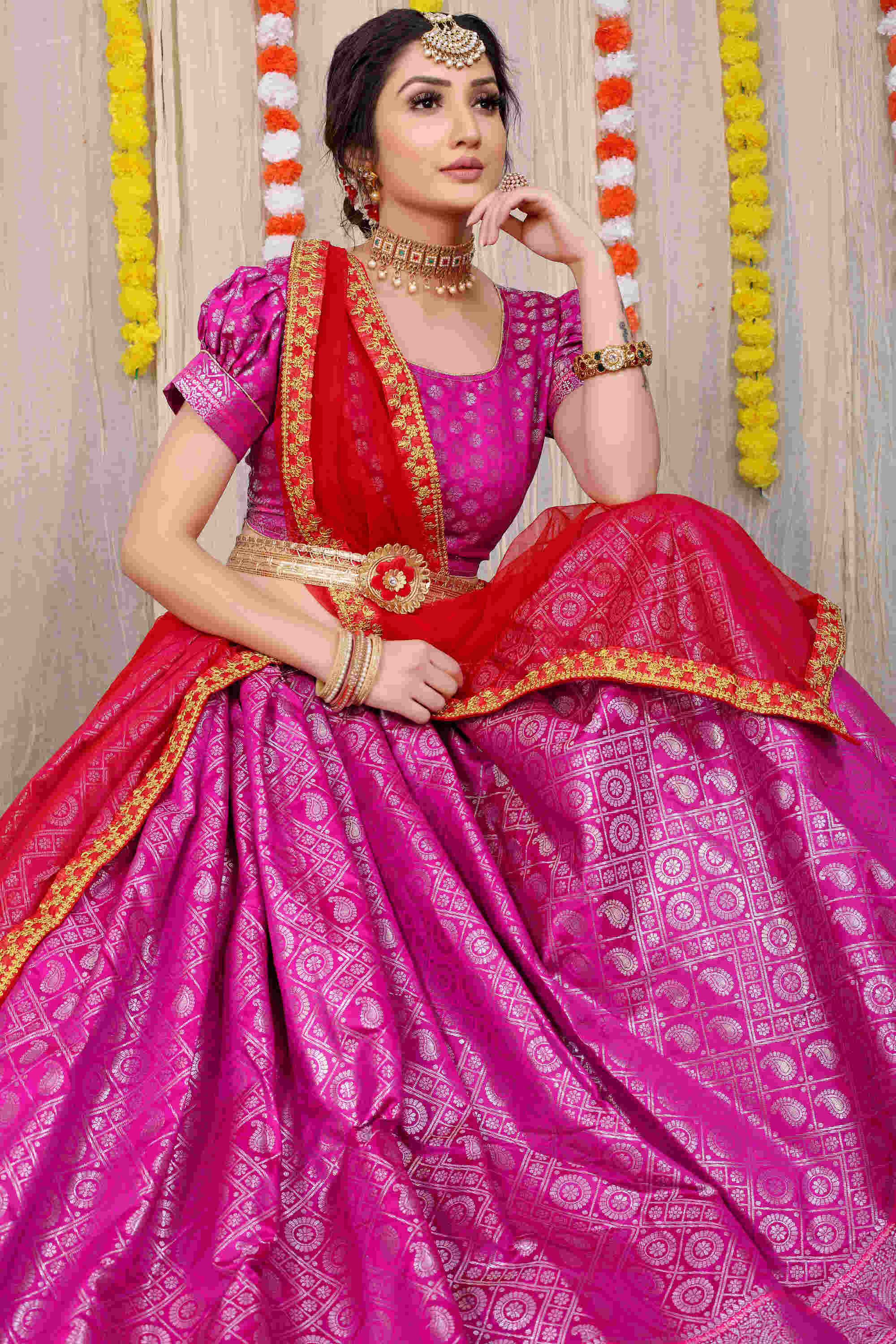 Pink color kanchipuram lehenga with zari weaving