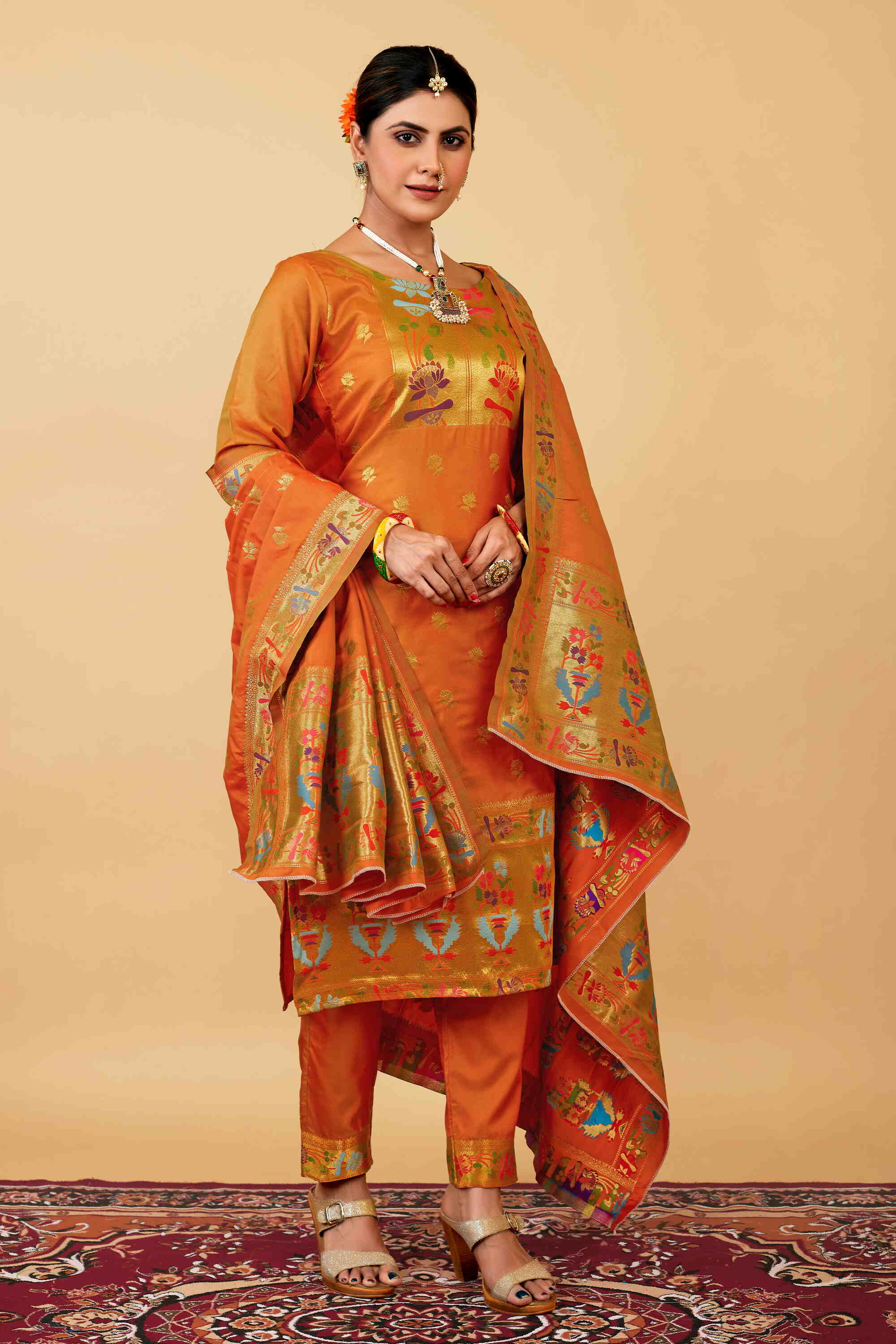 Orange color paithani silk unstitched Suit