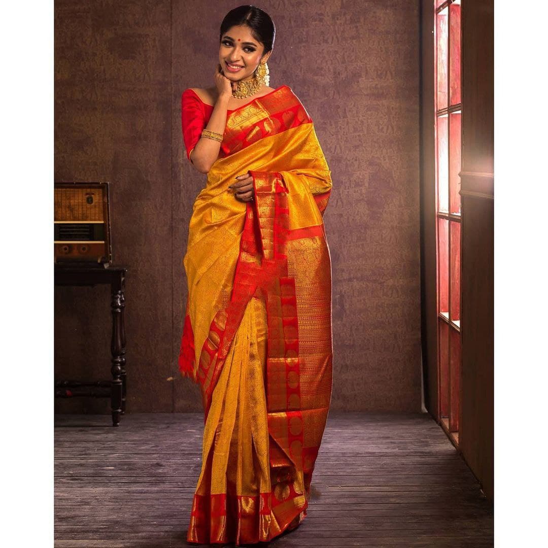 Yellow Soft Banarasi Silk Saree With Flattering Blouse Piece