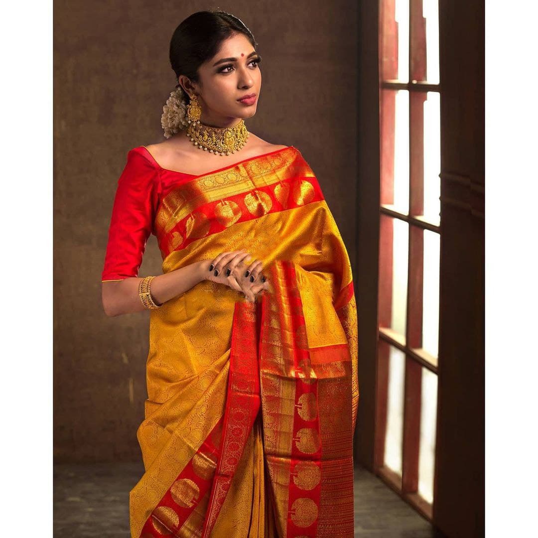 Yellow Soft Banarasi Silk Saree With Flattering Blouse Piece