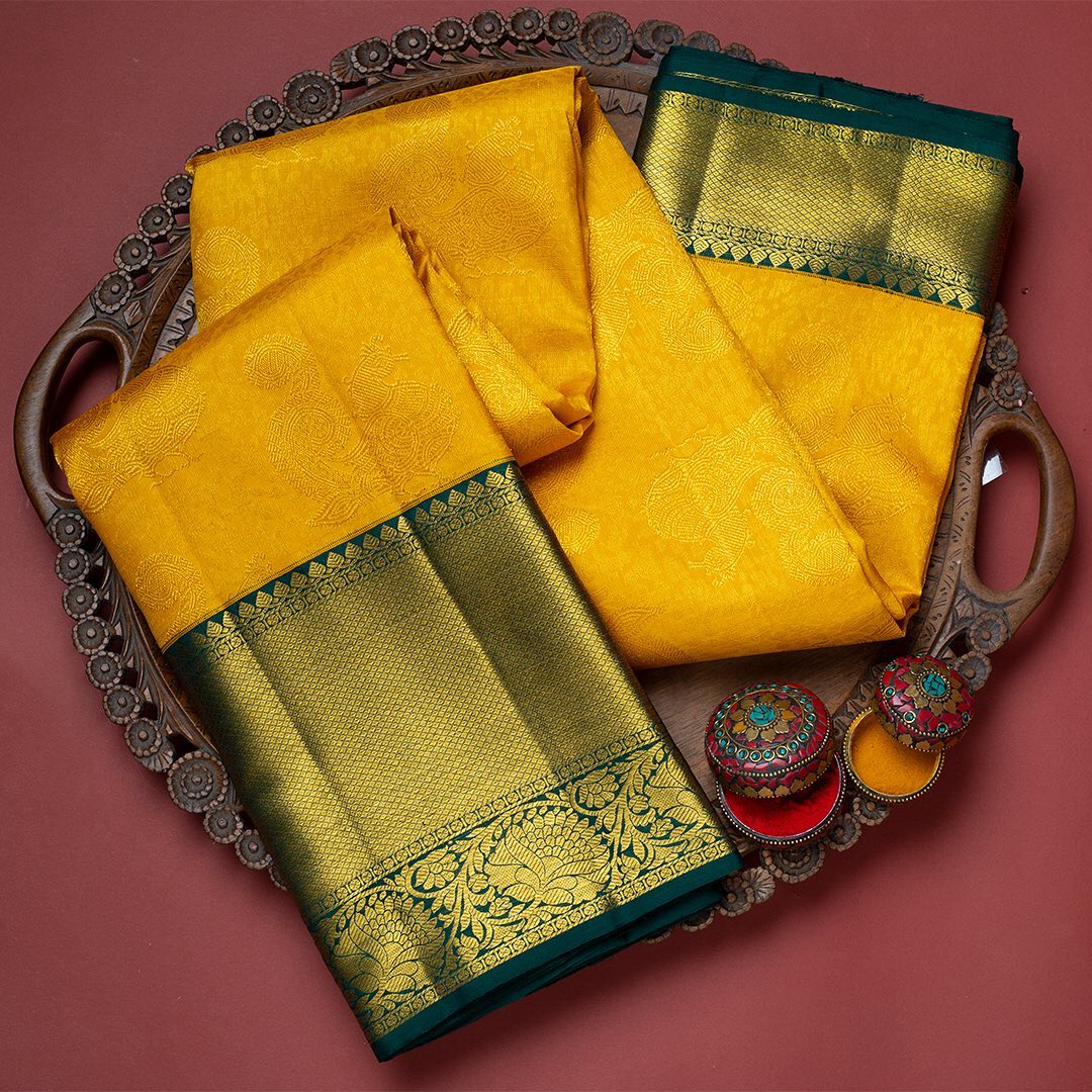 Yellow Soft Banarasi Silk Saree With Flattering Blouse Piece